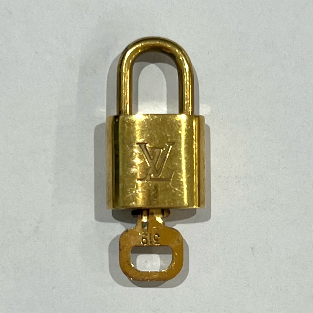 Louis Vuitton Shiny Gold Padlock with Key # 319